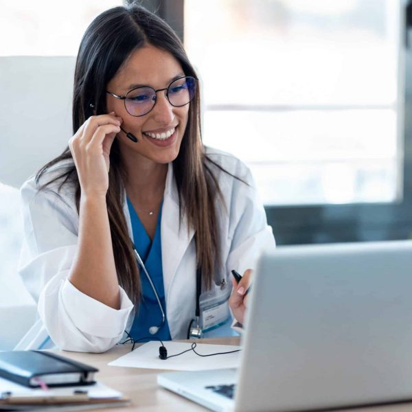 Shot,Of,Female,Doctor,Talking,With,Colleagues,Through,A,Video Shot,Of,Female,Doctor,Talking,With,Colleagues,Through,A,Video